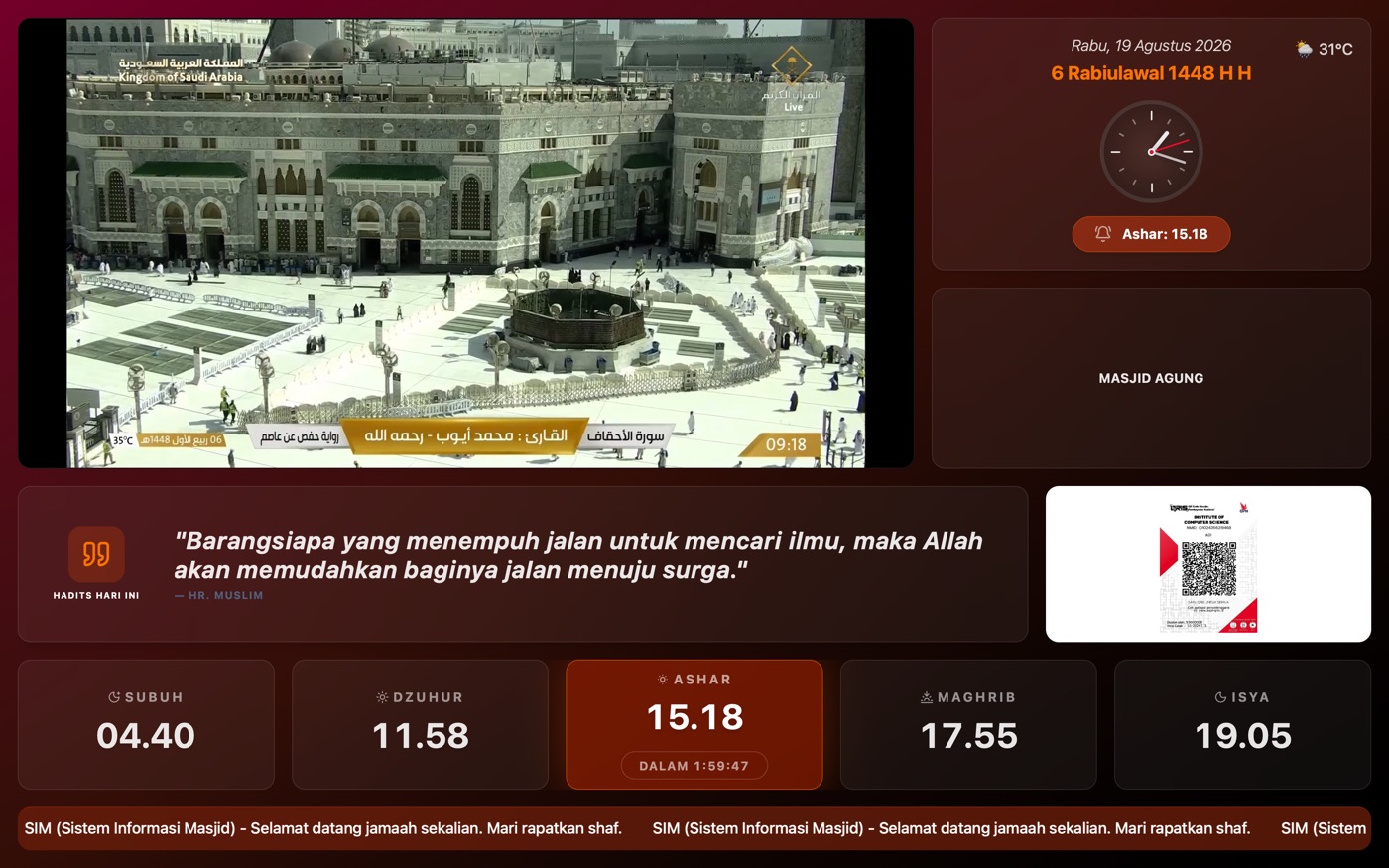 Layar bertema Rose dengan jam analog dan siaran langsung Masjidil Haram